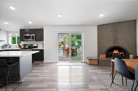 a kitchen with sink and furniture