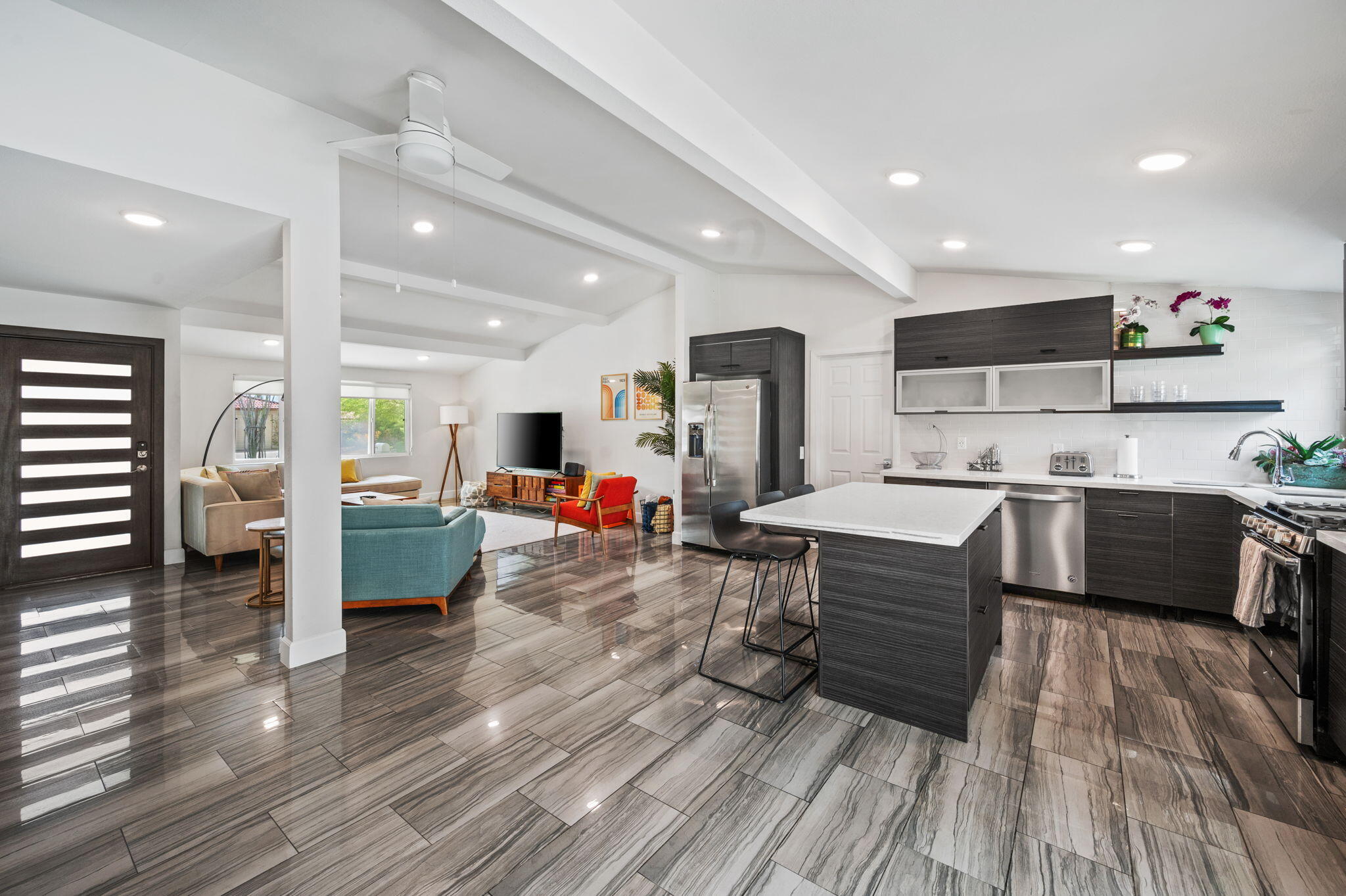 3059 North Biskra Road Palm Springs, CA 92262 - Photo 2 of 44 a living room with furniture and a wooden floor