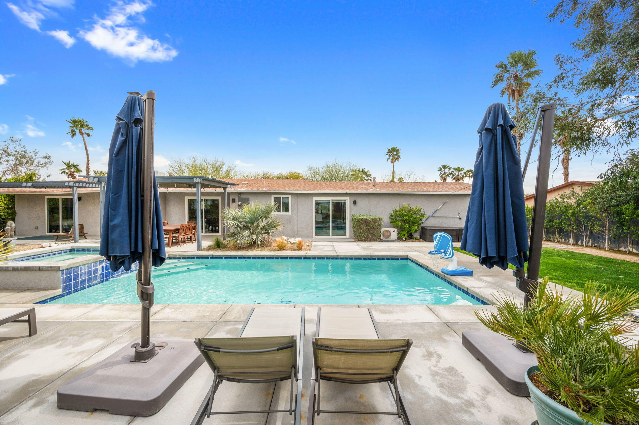 3059 North Biskra Road Palm Springs, CA 92262 - Photo 40 of 44 a view of house with backyard and outdoor seating