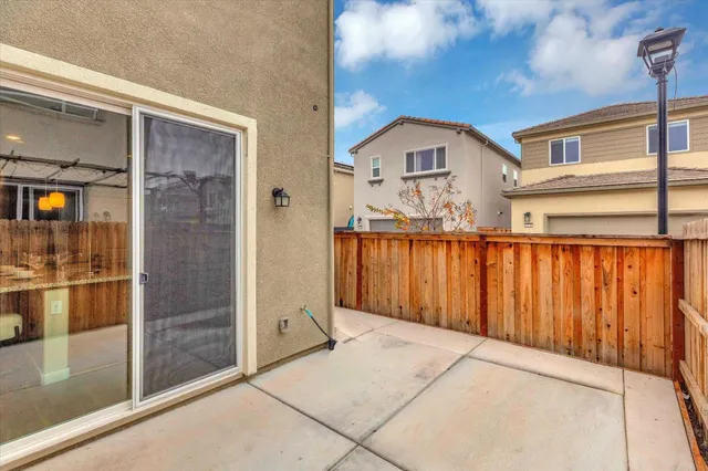 a view of a wooden house with a outdoor space