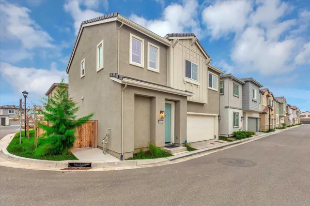 a view of a street with a house