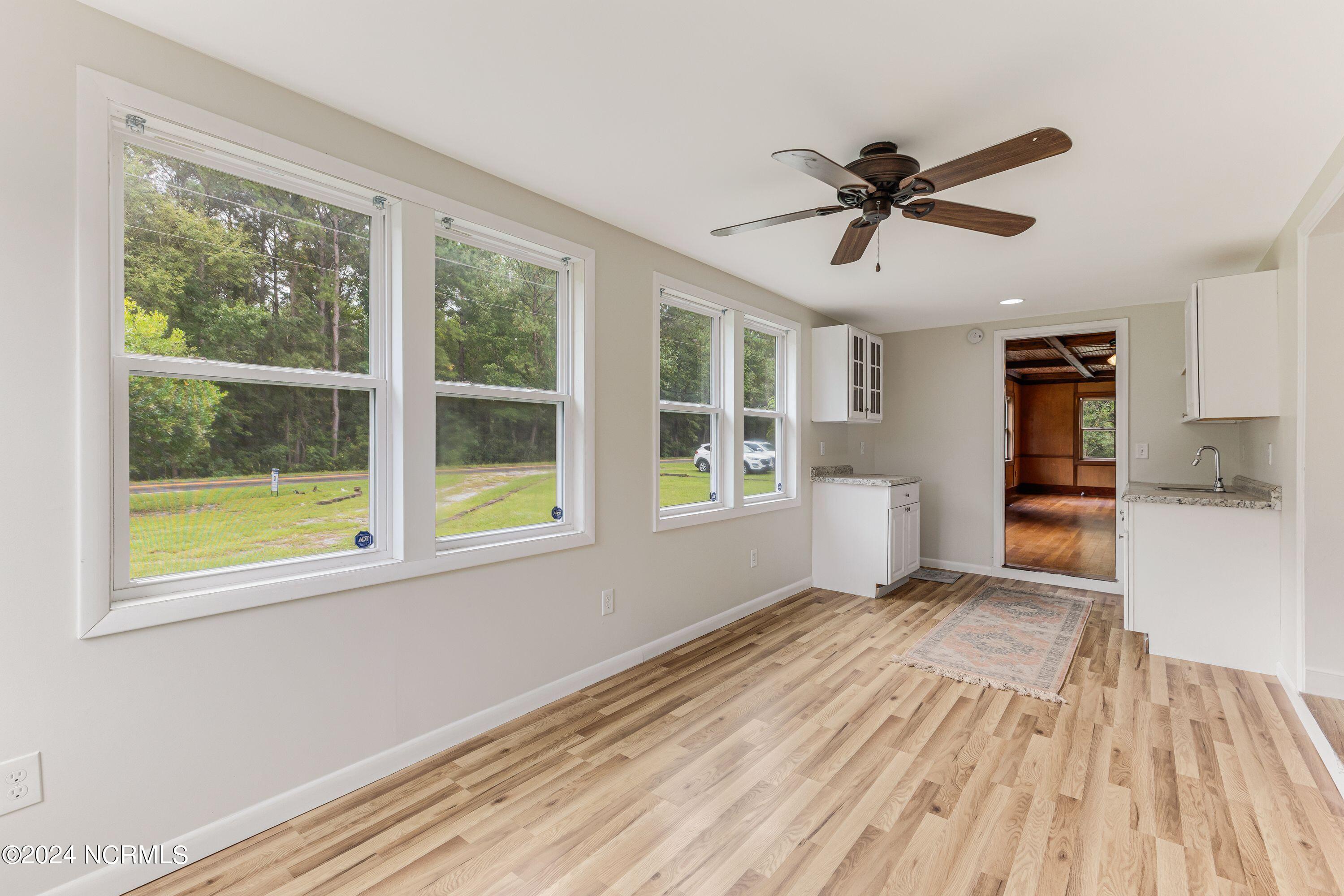 1398 Copas Road Southwest Shallotte, NC 28470 - Photo 8 of 31 den to wall of windows