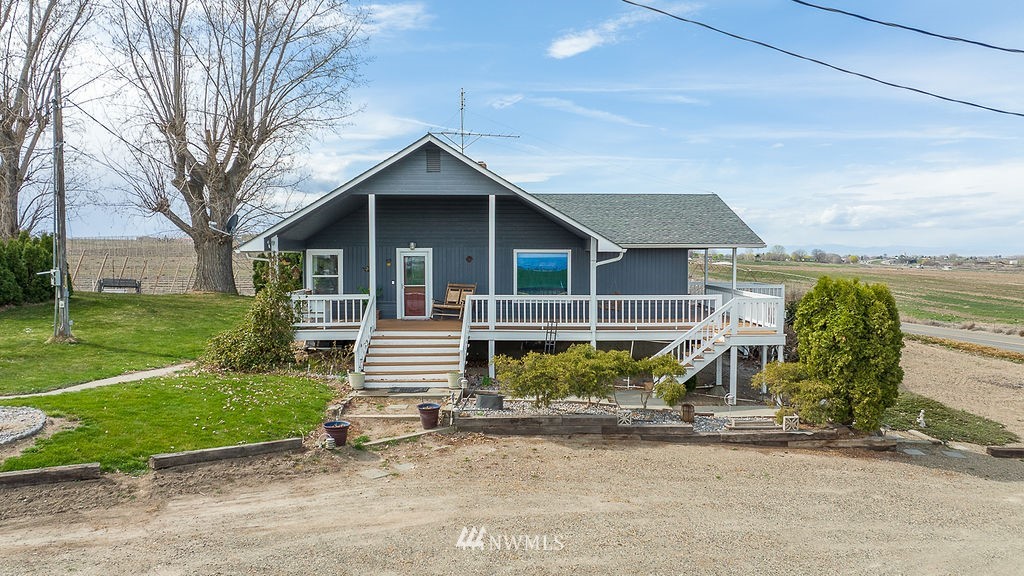 740 Gap Road Granger, WA 98932 - Photo 1 of 40 a view of a house with a yard