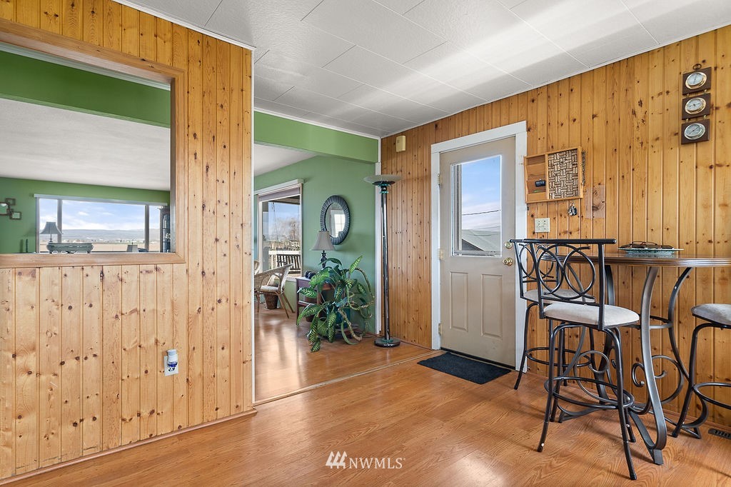 740 Gap Road Granger, WA 98932 - Photo 13 of 40 a view of a porch with chairs and front door