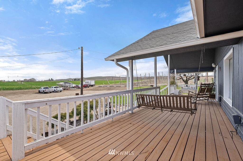 740 Gap Road Granger, WA 98932 - Photo 34 of 40 a view of balcony with wooden floor and fence