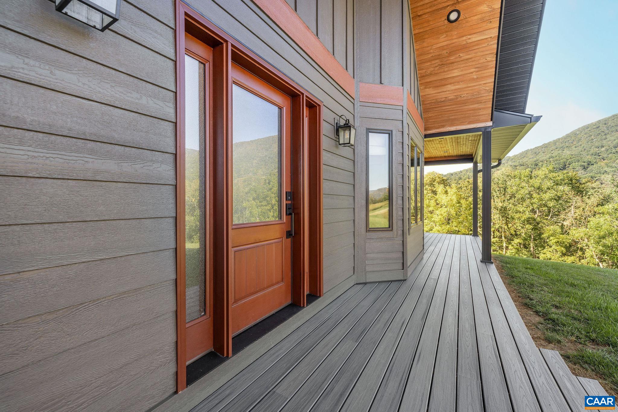 699 Hendrickson Road Pembroke, VA 24136 - Photo 13 of 69 a view of outdoor space and deck