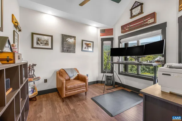 a kitchen with stainless steel appliances a stove top oven and a refrigerator
