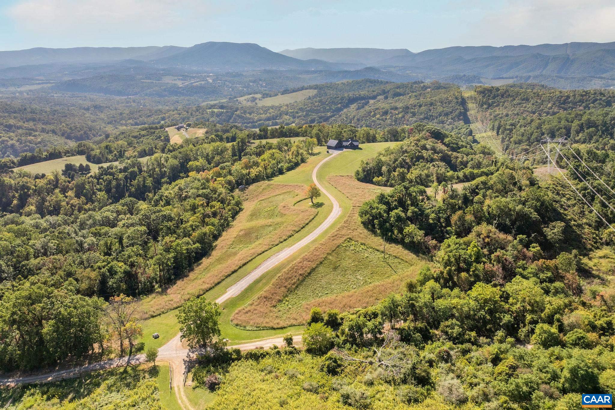 699 Hendrickson Road Pembroke, VA 24136 - Photo 2 of 69 a view of a city with a mountain