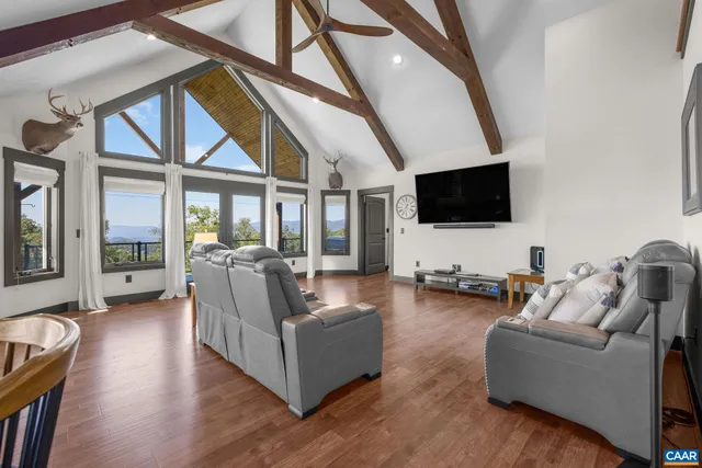 a view of balcony with wooden floor