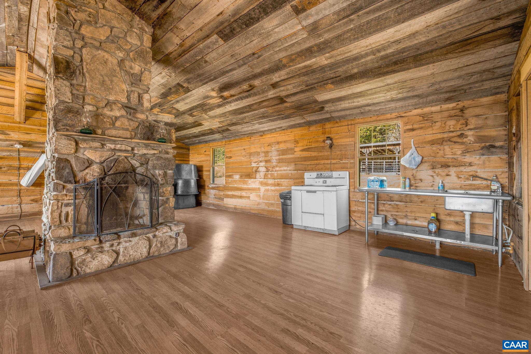 699 Hendrickson Road Pembroke, VA 24136 - Photo 60 of 69 a view of a room with wooden floor