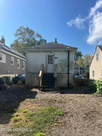 a view of a livingroom with a staircase