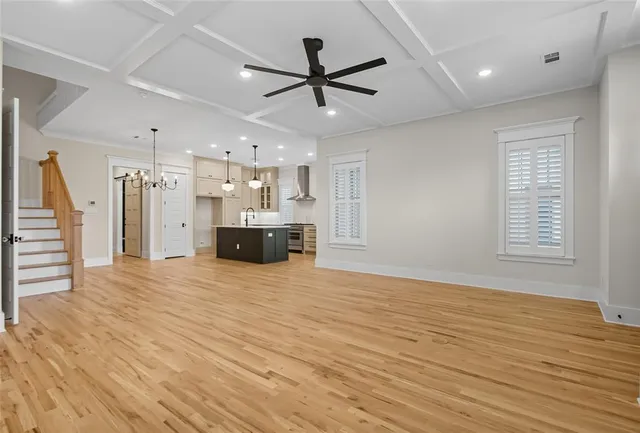 a view of a kitchen with a sink and a window