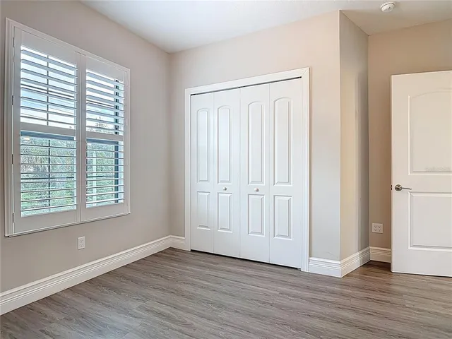 a view of a livingroom with wooden floor
