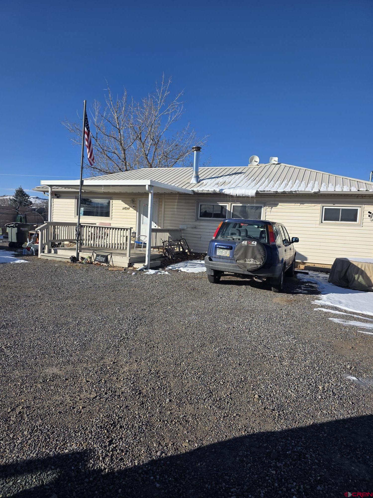62500 Lasalle Road Montrose, CO 81403 - Photo 3 of 15 a car parked on the side of the road