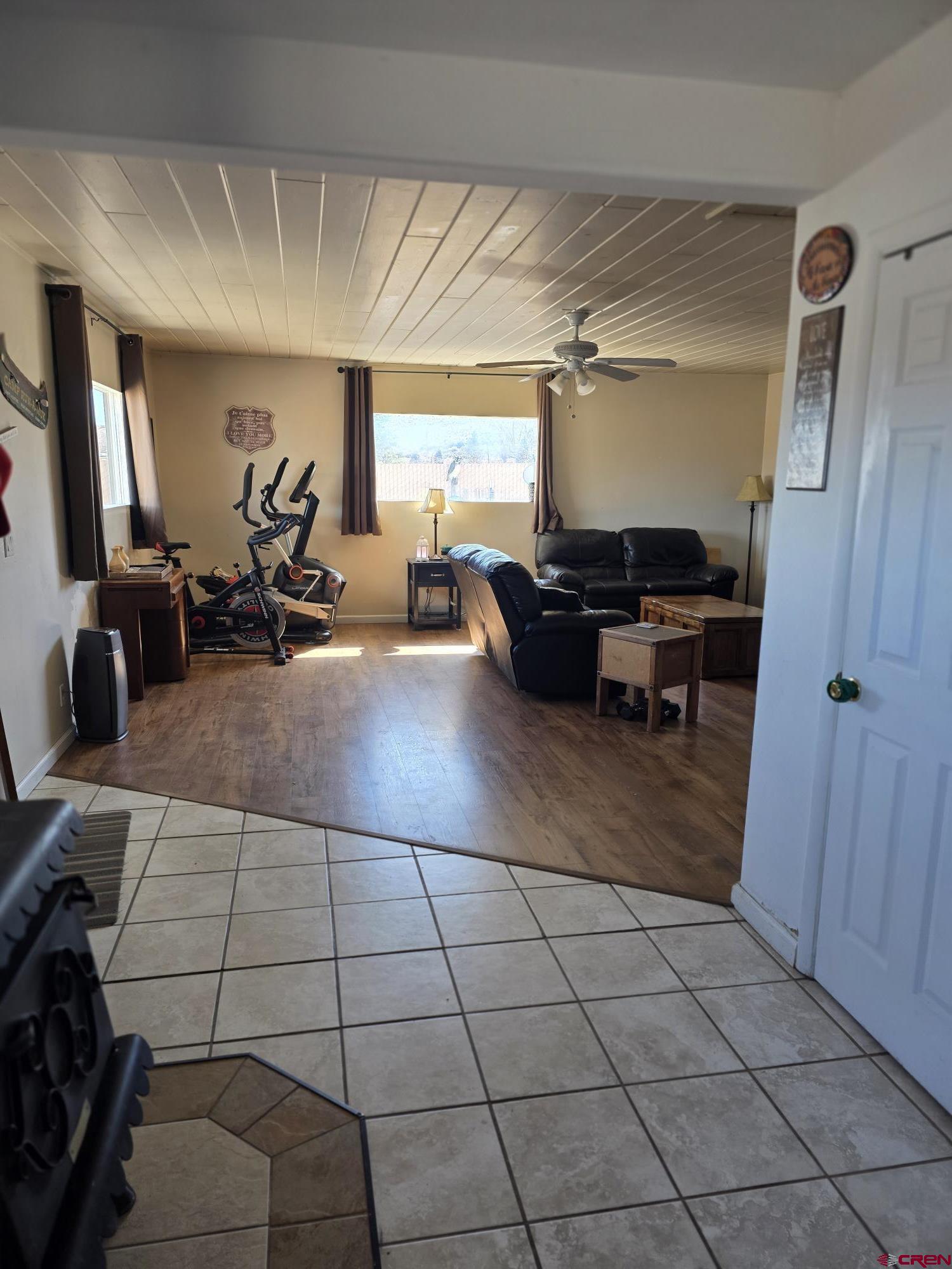 62500 Lasalle Road Montrose, CO 81403 - Photo 6 of 15 a view of a livingroom with furniture and a window