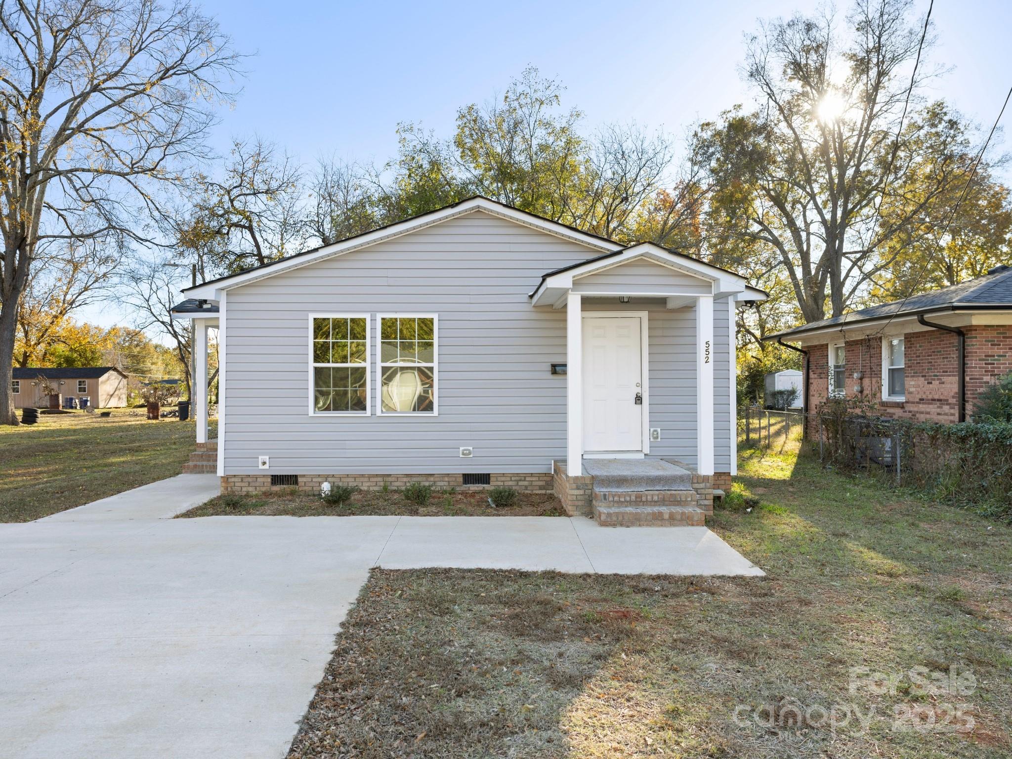 552 Locust Street Rock Hill, SC 29730 - Photo 1 of 24 a view of a house with a yard and large tree