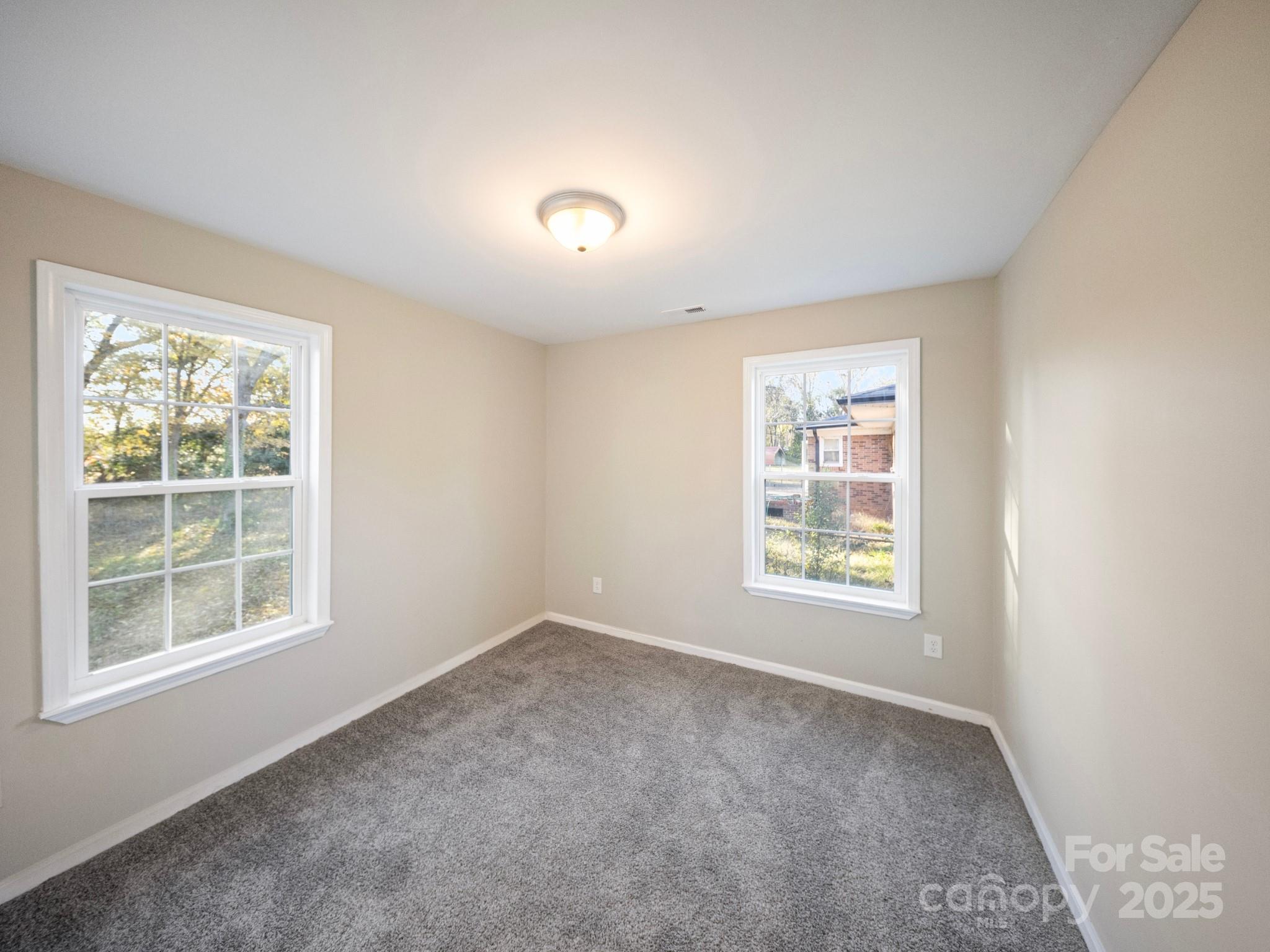 552 Locust Street Rock Hill, SC 29730 - Photo 14 of 24 an empty room with a window