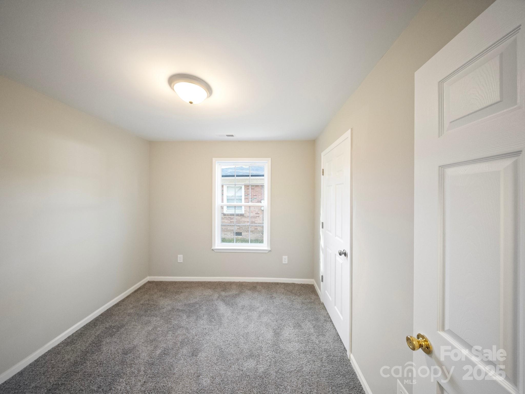 552 Locust Street Rock Hill, SC 29730 - Photo 21 of 24 an empty room with a window