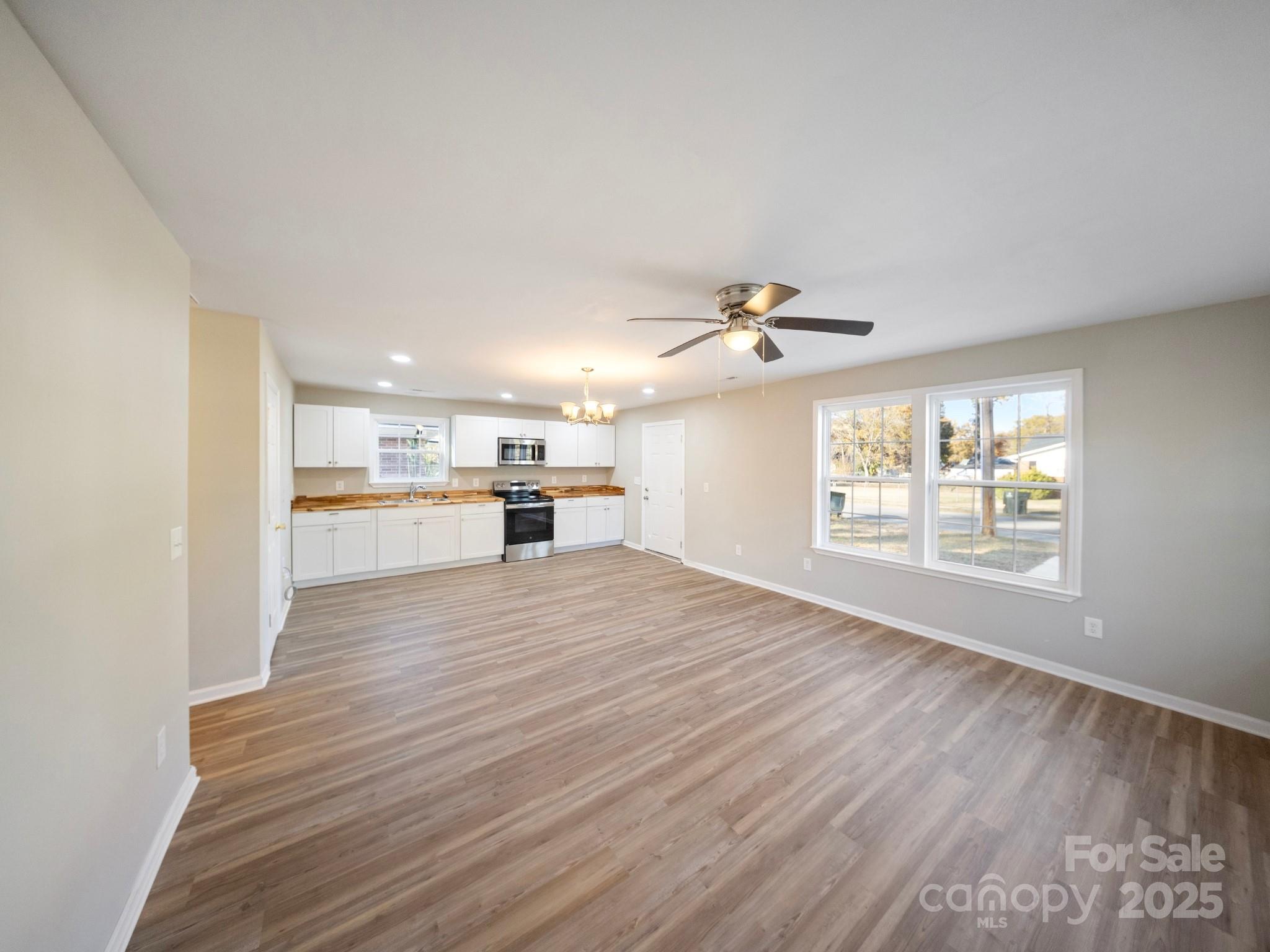 552 Locust Street Rock Hill, SC 29730 - Photo 5 of 24 a view of a kitchen with a sink and a window