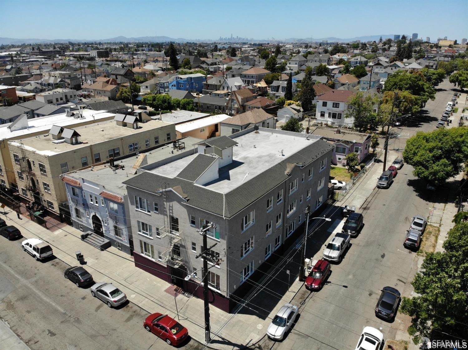 1945 26th Avenue Oakland, CA 94601 - Photo 4 of 5 an aerial view of a house with a yard garage and a balcony