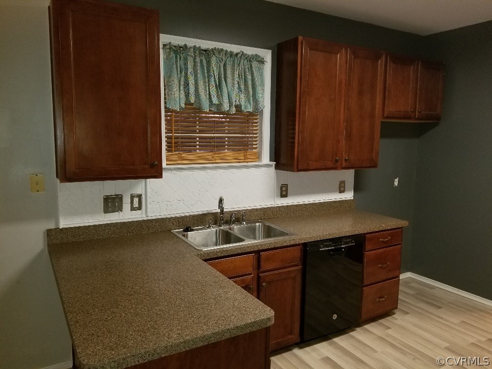 3051 Kinvan Road Henrico, VA 23231 - Photo 10 of 38 a kitchen with a sink and a cabinets