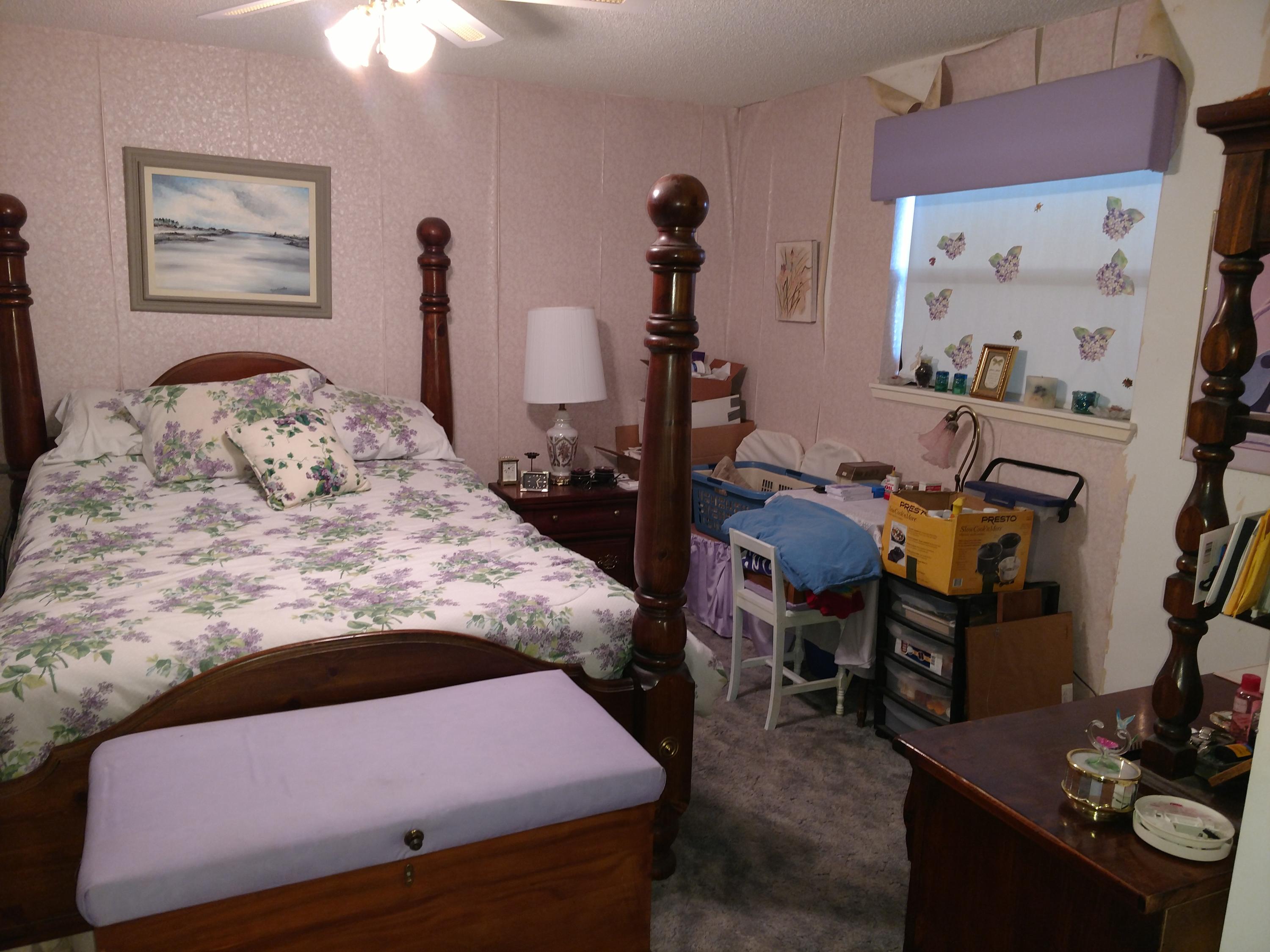 27 Choctawhatchee Road Southeast Fort Walton Beach, FL 32548 - Photo 15 of 20 a bedroom with bed and a mirror