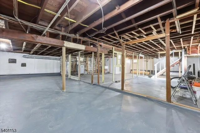 a view of an empty room with wooden roof