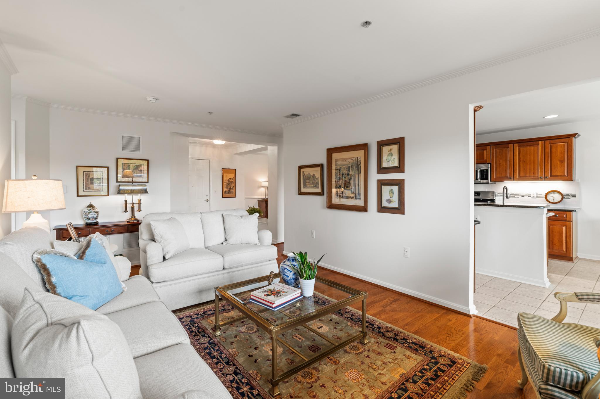 12246 Roundwood Road, Unit 507 Lutherville-Timonium, MD 21093 - Photo 13 of 58 Living Room with Crown Molding