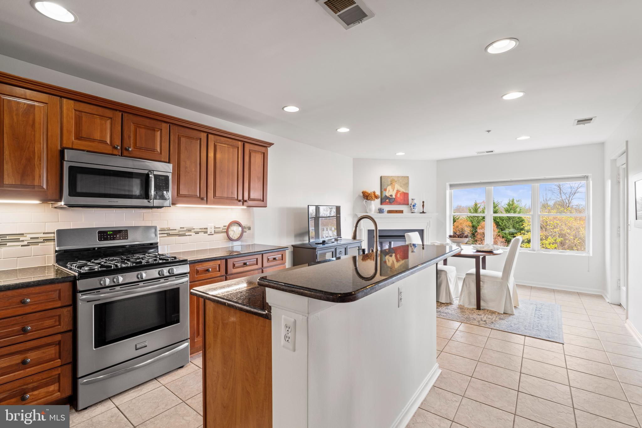 12246 Roundwood Road, Unit 507 Lutherville-Timonium, MD 21093 - Photo 18 of 58 Sunny Open Eat-in Kitchen - Family Room