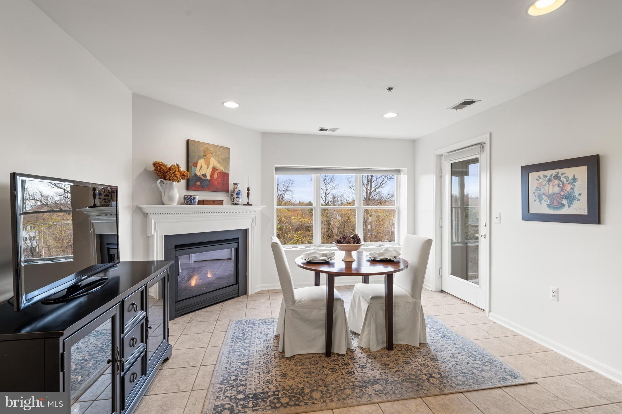 12246 Roundwood Road, Unit 507 Lutherville-Timonium, MD 21093 - Photo 23 of 58 Breakfast Room/Family Room w/a Gas Fireplace