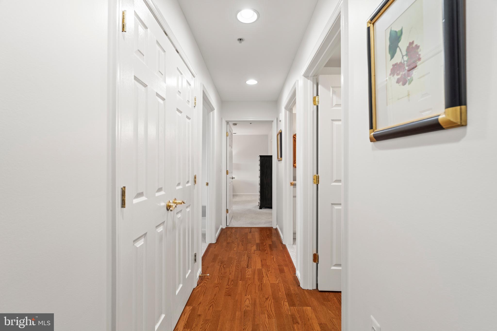 12246 Roundwood Road, Unit 507 Lutherville-Timonium, MD 21093 - Photo 28 of 58 Hallway to the Den and the Bedrooms