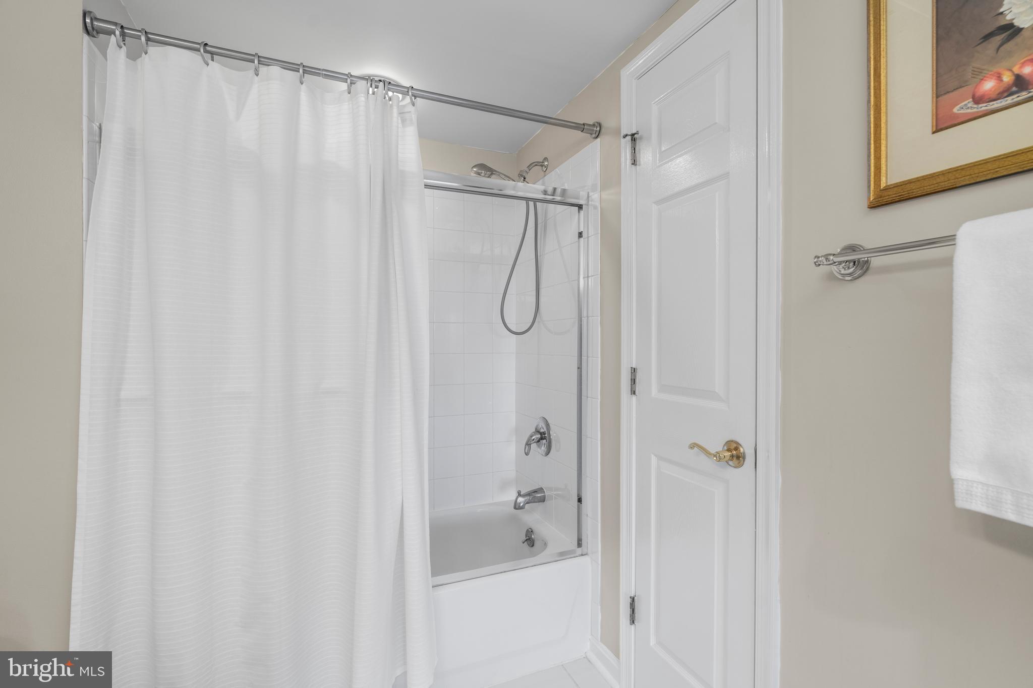 12246 Roundwood Road, Unit 507 Lutherville-Timonium, MD 21093 - Photo 40 of 58 Shower Tub Combo and a Linen Closet