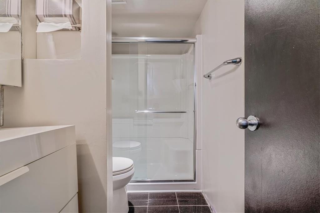 2034 Swallow Hill Road, Unit 328 Pittsburgh, PA 15220 - Photo 14 of 19 a bathroom with a shower and a toilet