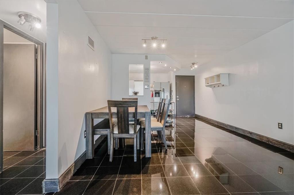 2034 Swallow Hill Road, Unit 328 Pittsburgh, PA 15220 - Photo 5 of 19 a view of a dining room with furniture