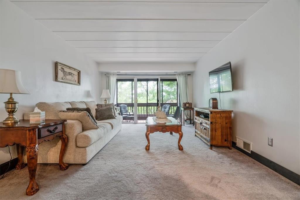 2034 Swallow Hill Road, Unit 328 Pittsburgh, PA 15220 - Photo 6 of 19 a living room with furniture and a window