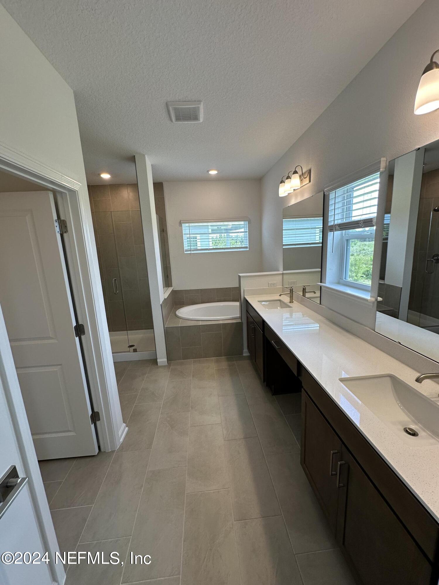 213 Whirlwind Place, Unit 239 St. Augustine, FL 32095 - Photo 4 of 9 172 Primary Bath