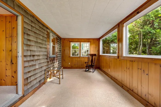 a view of an empty room and window