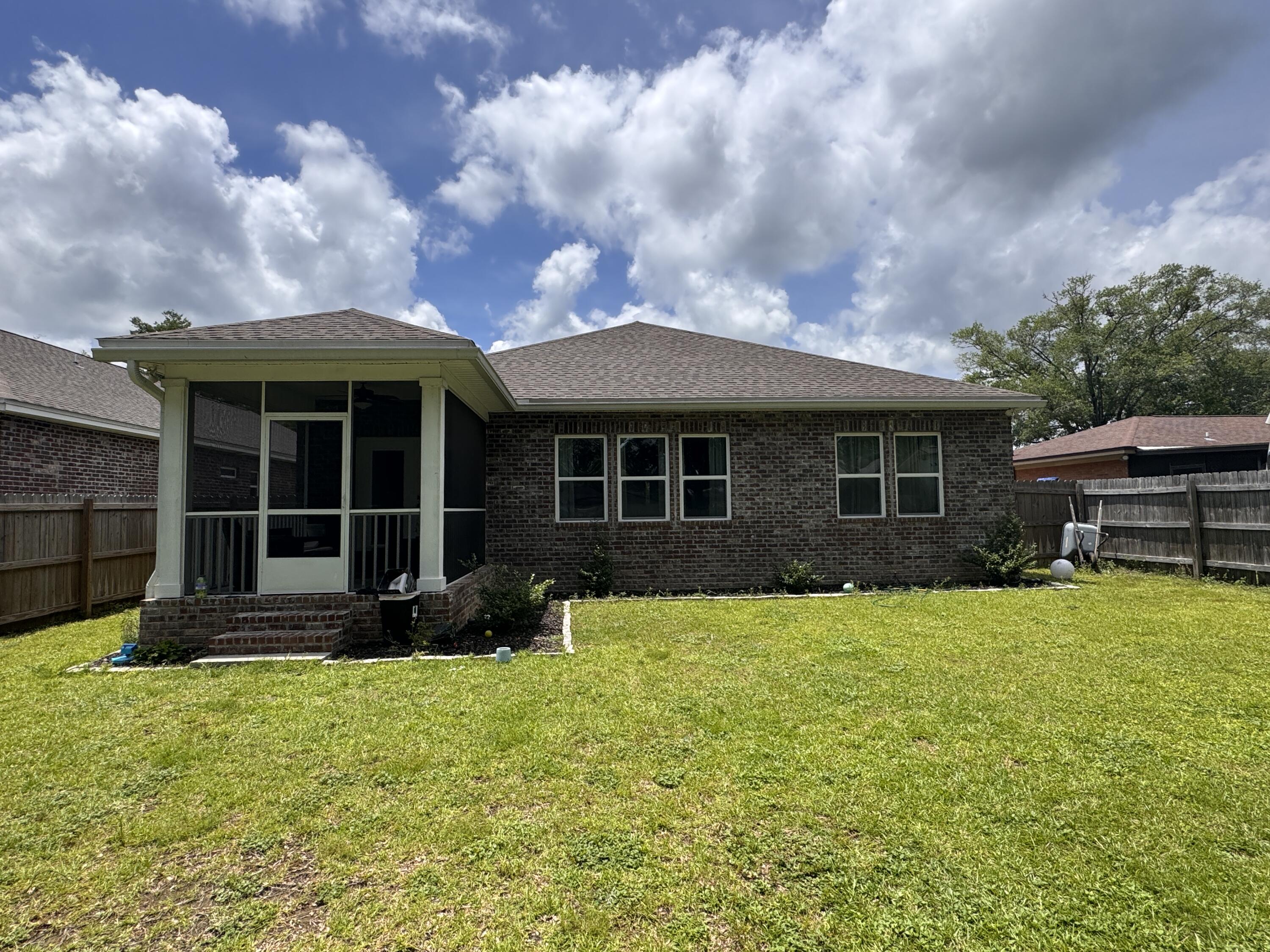 72 Wolverine Avenue Valparaiso, FL 32580 - Photo 20 of 20 a front view of a house with a yard