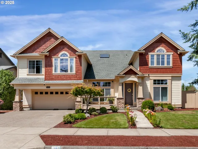 a front view of a house with garden