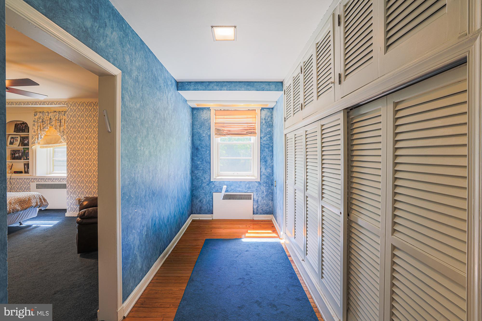 3305 Bancroft Road Baltimore, MD 21215 - Photo 49 of 61 Bright hallway with charming blue hues.