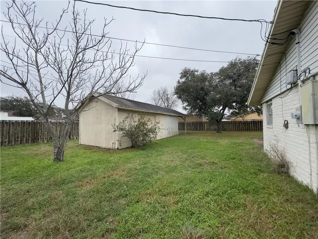a view of a backyard with a garden