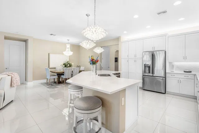 a bathroom with a sink vanity and mirror