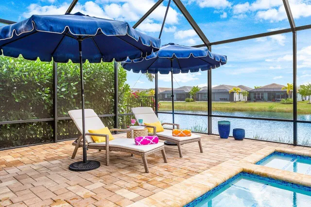 a front view of a house with garden and porch