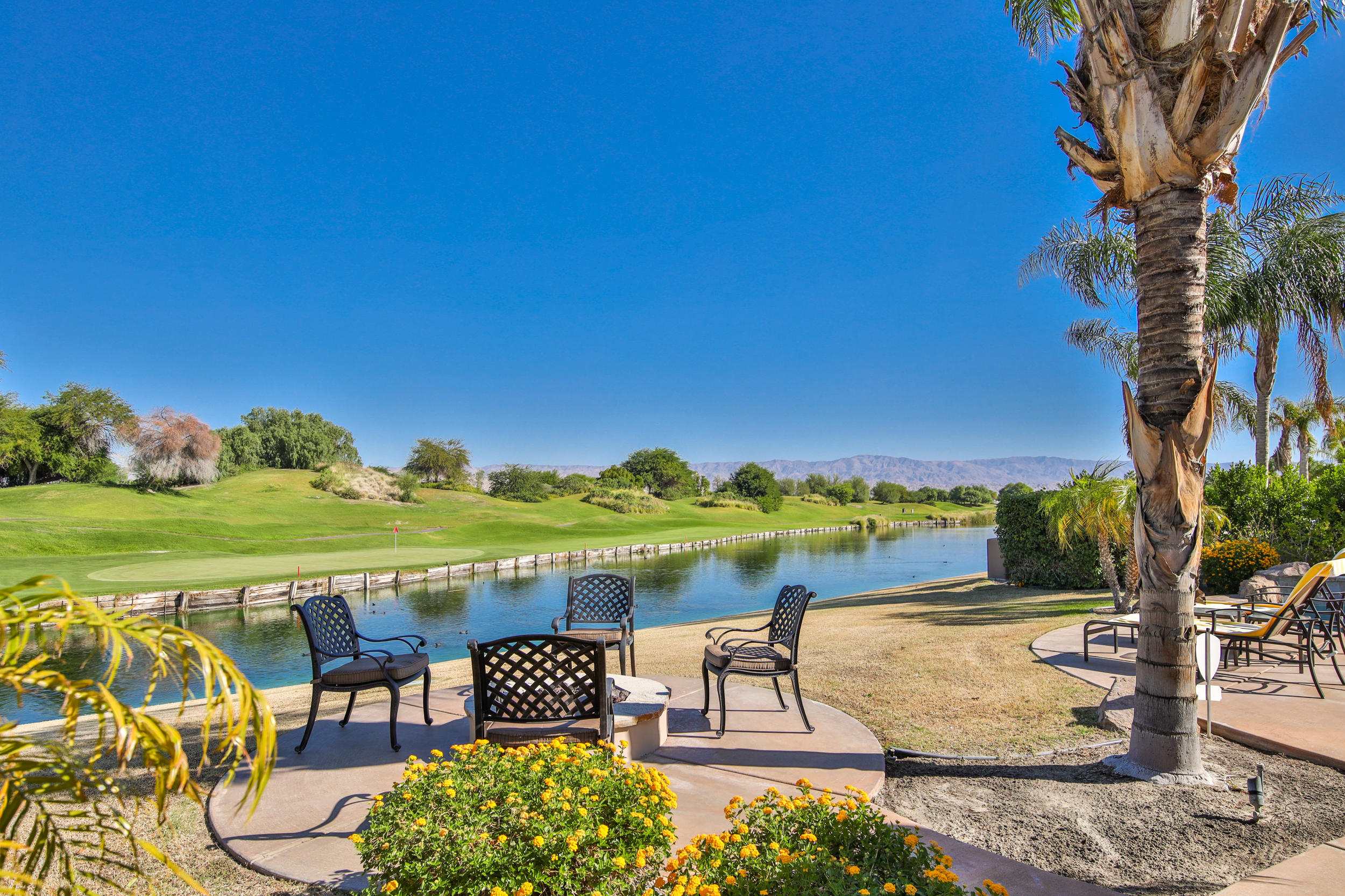 360 Loch Lomond Road Rancho Mirage, CA 92270 - Photo 40 of 76 a view of a swimming pool with an outdoor seating