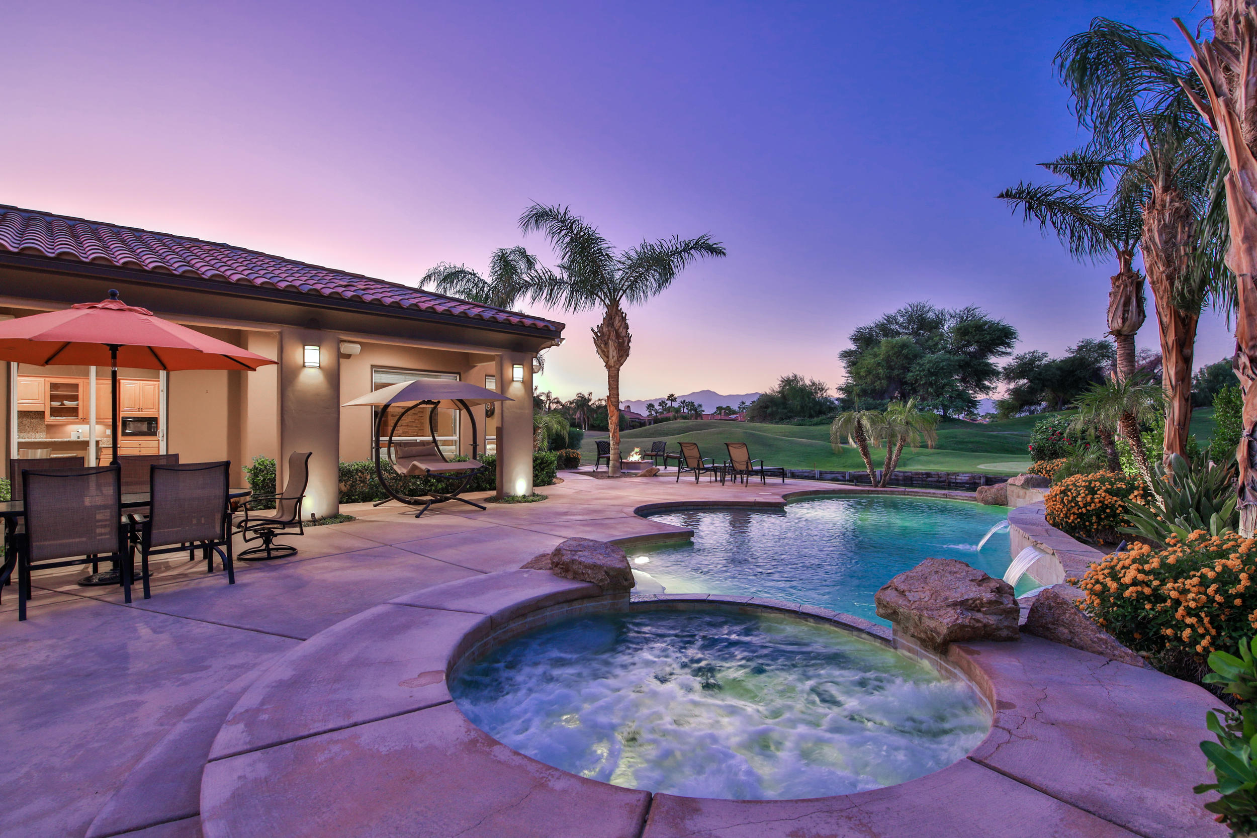 360 Loch Lomond Road Rancho Mirage, CA 92270 - Photo 56 of 76 a view of a swimming pool with a patio