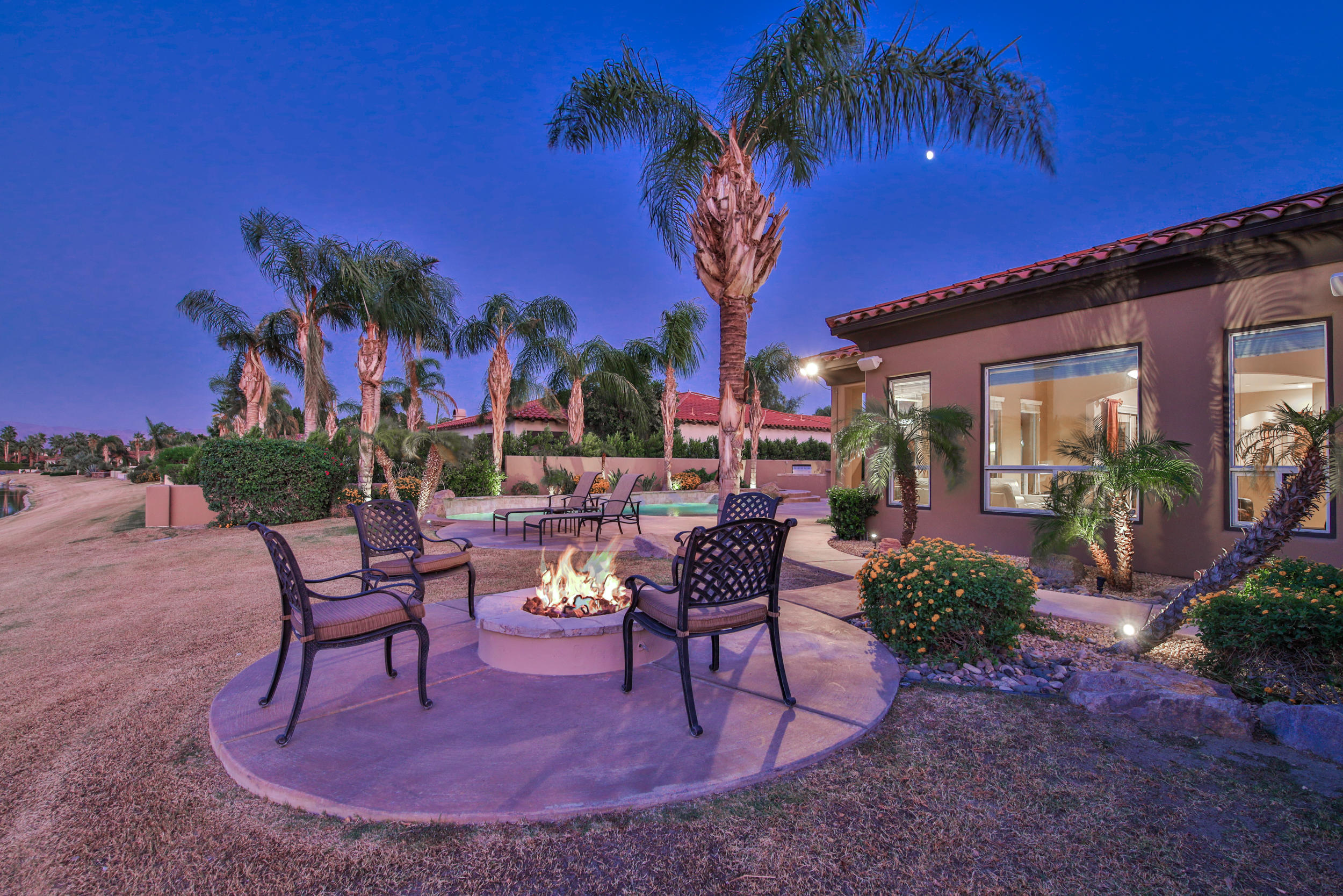 360 Loch Lomond Road Rancho Mirage, CA 92270 - Photo 60 of 76 a view of a chairs and tables in patio