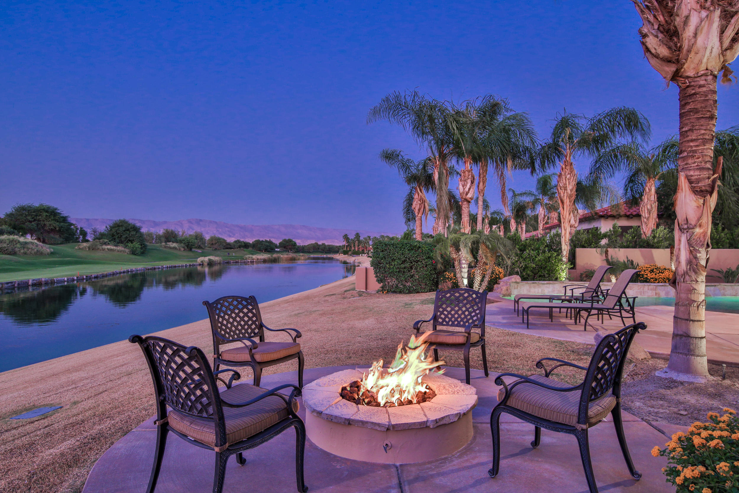 360 Loch Lomond Road Rancho Mirage, CA 92270 - Photo 61 of 76 a view of a lake with furniture and city view