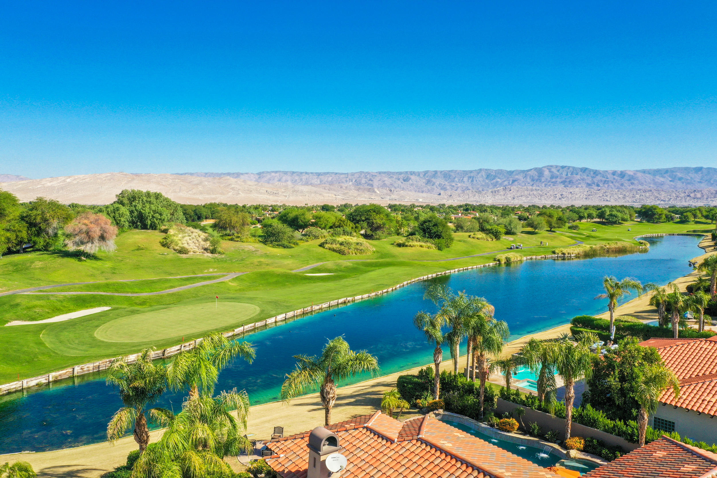 360 Loch Lomond Road Rancho Mirage, CA 92270 - Photo 70 of 76 a view of a city with a lake view