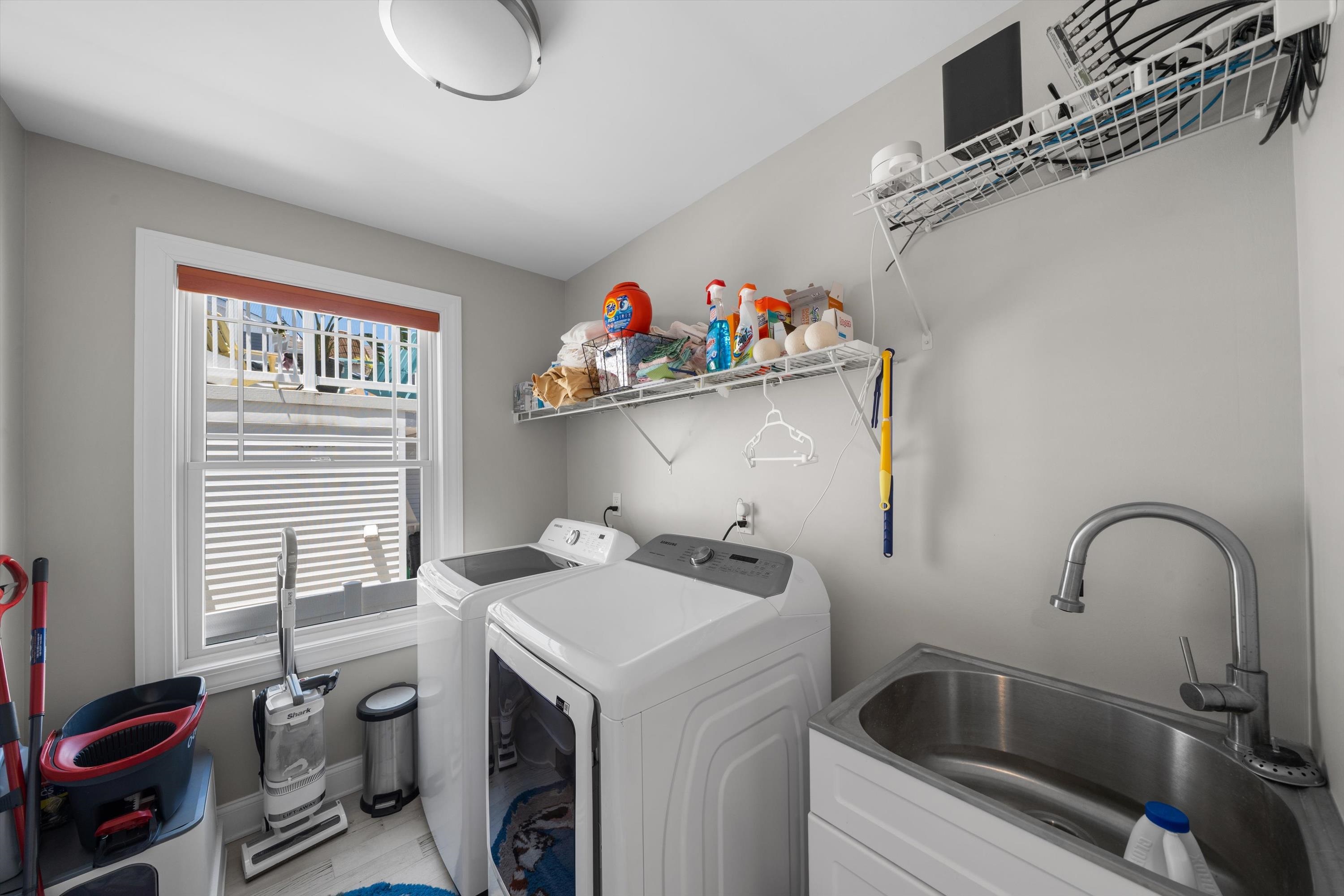 305 East Stockton Road Wildwood Crest, NJ 08260 - Photo 10 of 28 a utility room with dryer and washer