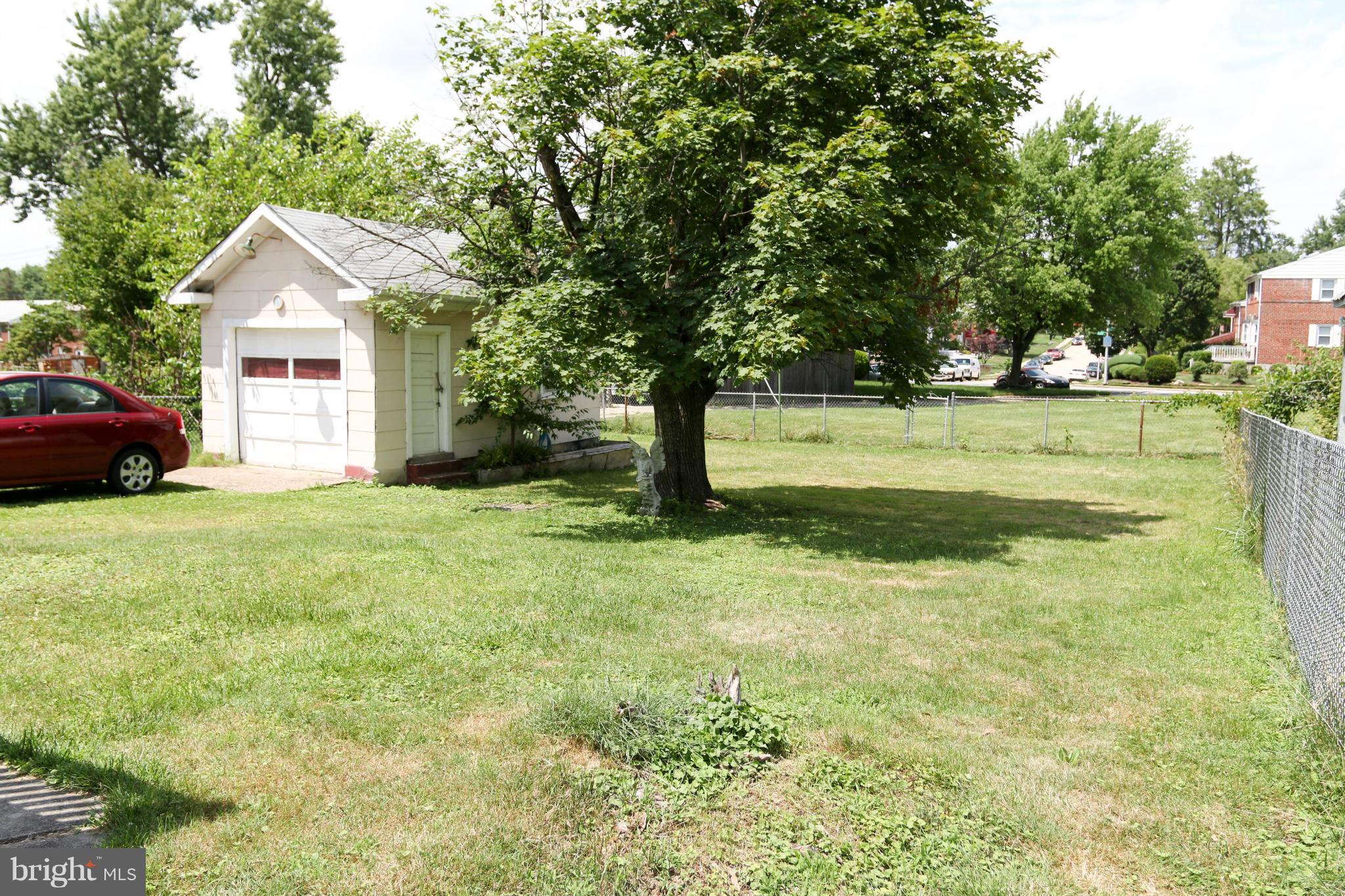 2212 Corbin Road Baltimore, MD 21214 - Photo 15 of 17 Great Fenced Yard with Garage View